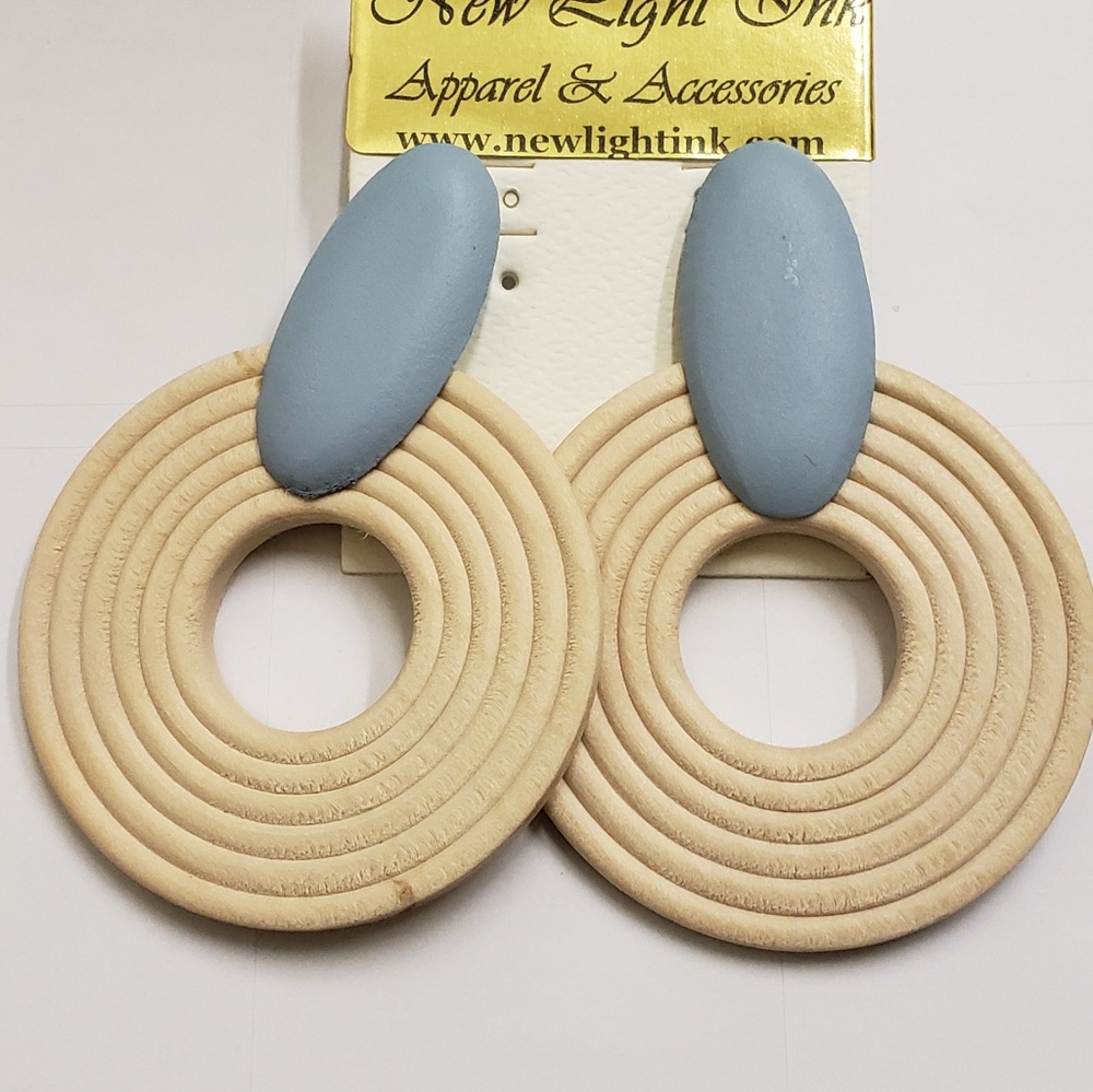 Earrings by: New light ink Apparel and Accessories